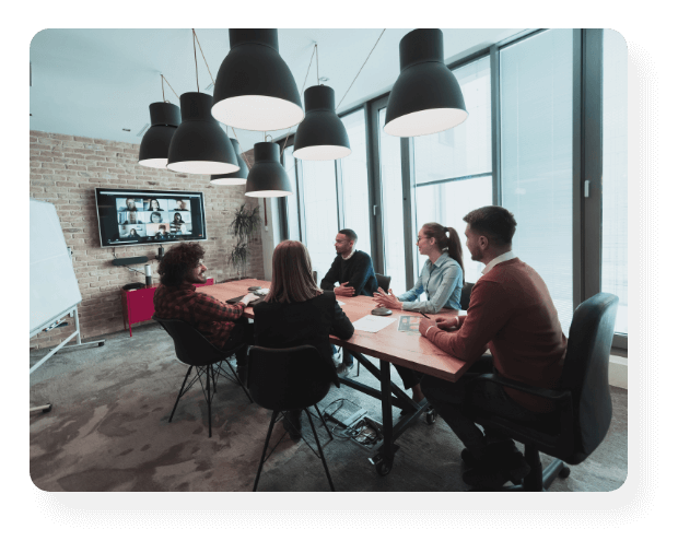 people having a zoom meeting and at the office